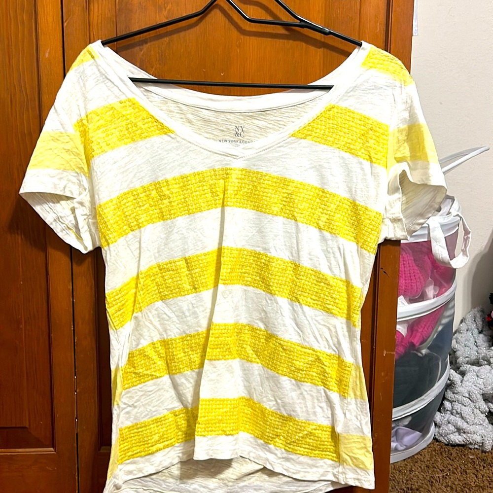 sequenced shirt size is XL the brand is New York and company